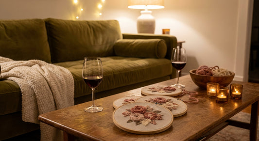 Cozy bachelorette craft night with wine and needlepoint canvases